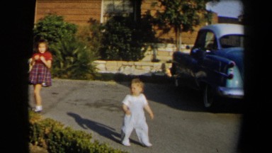 1958: children outside playing in the driveway. CALIFORNIA