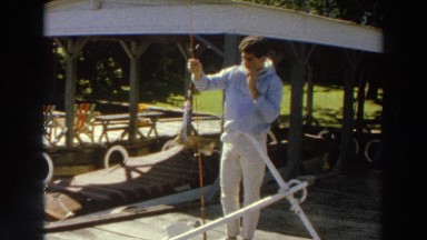 1966: Young Man Shows Off Fish at Dock in Madison Wisconsin