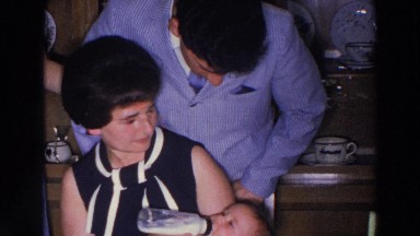 1966: Woman Holds Baby and Feeds It Bottle Madison Wisconsin