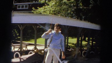1966: A Handsome Young Man Smoking a Cigarette While Holding a Caught Fish