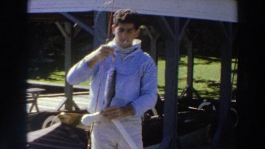 1966: man showing off his fish that he just caught. MADISON WISCONSIN