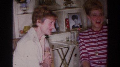 1966: people smiling and having a good time in their house. MADISON WISCONSIN