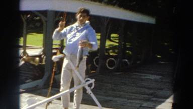 1966: man looking at the fish he just caught. MADISON WISCONSIN