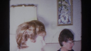 1966: a room full of middle aged people gather for a party MADISON WISCONSIN