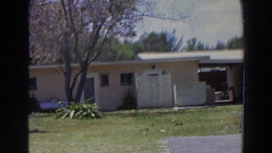 1966: person standing in front of his home