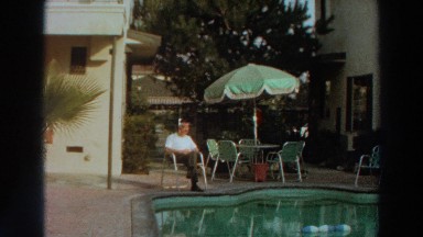 1966: man sitting quietly by the swimming pool. PUERTO RICO