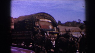 1958: talking with a man traveling a traditional and ancient cart
