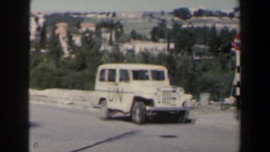 1960: a un truck parked on the left side of the road on the outskirts ISRAEL