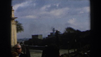 1960: view of an interesting building with a clock right at the top. ISRAEL