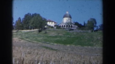 1960: view of a fancy building sitting in a field. ISRAEL