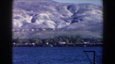 1960: large lake surrounded by rolling mountains. ISRAEL