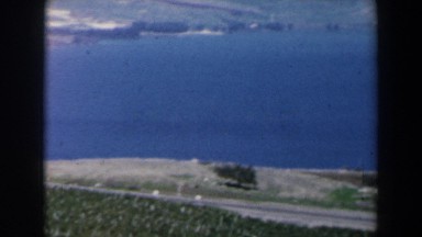 1960: traveling across a beach with blue ocean water in vehicles ISRAEL
