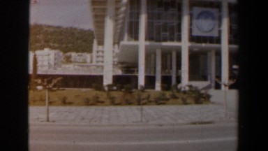 1960: Magnificent Building Street View Cars Moving Along Israel