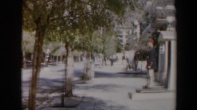1960: View of a Historical Monument with People Walking Around