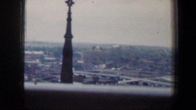 1960: the city passing by through the view of a window BALTIMORE MARYLAND
