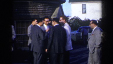 1963: A Group of People Standing Outside Around Cars Niagara Falls