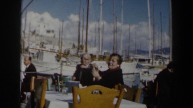 1960: Group of People Dining Outdoors Near Water in Israel