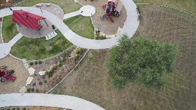 overhead video of children playing in a park during the day COLORADO