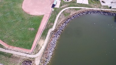 aerial view of ground with grounds, ponds and parking areas COLORADO