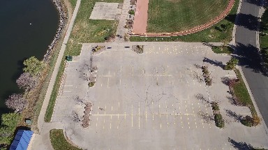 a baseball field and a parking lot, seen from far above COLORADO