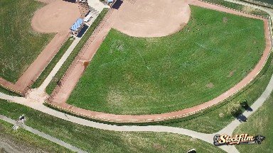 Colorado, United States: Aerial View of a Grassy Area for Sports Entertainment Near a Body of Water