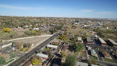 aerial view of roads and outlets surrounding structures and other life forms