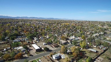 view from an airplane of a small town. COLORADO