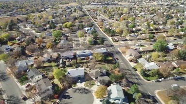 Colorado, United States: An Aerial View of a Major Road Running Through an Urban Residential Area