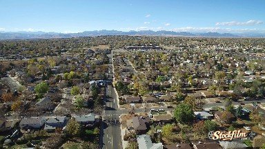 Colorado, United States: The Aerial View of a Large Town with Many Buildings, Roads, Greenery etc.