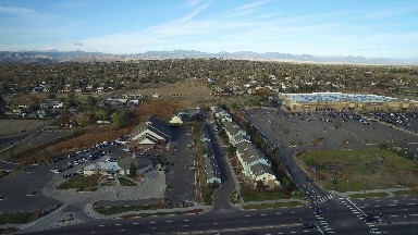 a bird's eye view of a town and it's beautiful surroundings COLORADO
