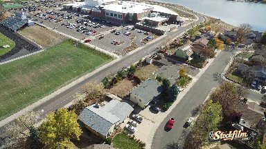 Aerial Video of a Parking Lot, Buildings, Roadways and Grassy Area Colorado