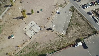 camera from high above observing city area highway car moving COLORADO