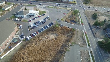 a bird's eye view of a busy highway with roads running off COLORADO