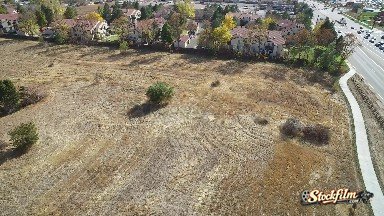 Colorado, United States: Cars Driving Down a Four-Lane Highway in a Rural Town