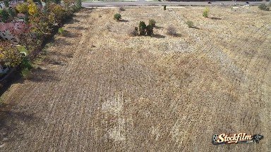 Flyover Footage Of A Hay Field Next To A Highway Colorado