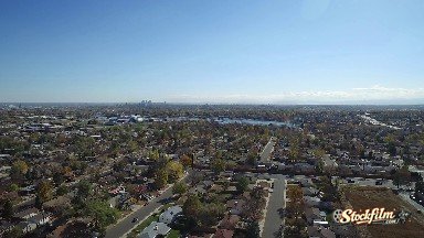 Colorado, United States: The View Flying Over the Top of a Town That Has a Body of Water