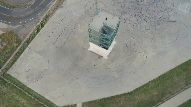 a top view of a building and surrounded area