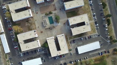 airplane view of a small community with a lot of buildings. COLORADO