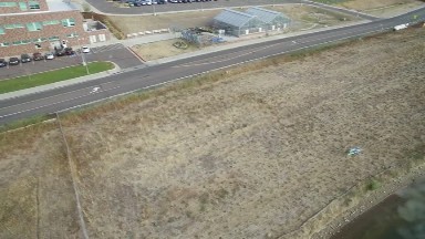 view of a town from above with roads and buildings that seem small COLORADO