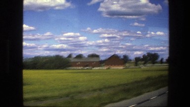 1975: sightseeing a small town from a moving car. SWEDEN