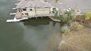 panoramic view of a beautiful and modern building on the edge of a lake COLORADO