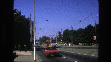 1975: trolley randomly driving down the street. SWEDEN