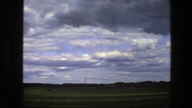 1975: driving and filming out the window of the vehicle at the landscape