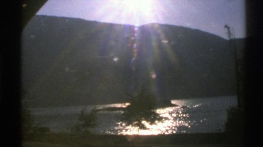1976: motion seeing water alongside reflection of sun shining bright NORWAY