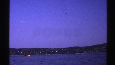 1976: boat out on the water and plane in the sky NORWAY