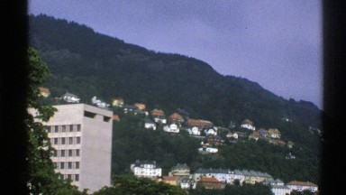 1976: view of a small habitated village located next to a hill NORWAY