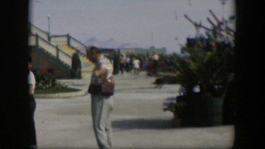 1951: random visitors walking through an amusement park. UTAH