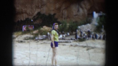 1951: a woman exploring a canyon UTAH