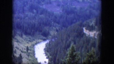 1951: lush valley with river running through it WYOMING