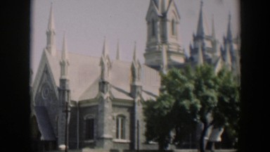 1951: the spires of an elaborate cathedral lined with trees WYOMING